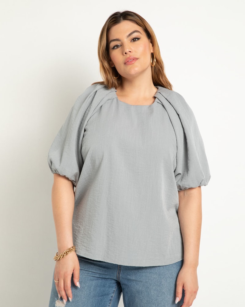 Front of a model wearing a size 24 Puff Sleeve Textured Rayon Top in Slate Blue by ELOQUII. | dia_product_style_image_id:303808